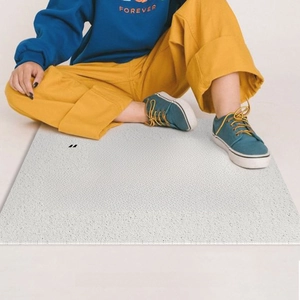 Minimalist PVC anti-slip entryway mat with Hello text on white background and grainy texture