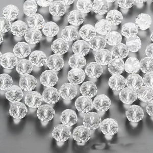 Macro view of faceted Aurora crystal glass beads with through-holes for DIY jewelry