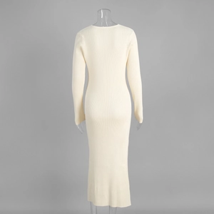 Detailed back view of cream rib-knit maxi dress with textured vertical vertical stripes