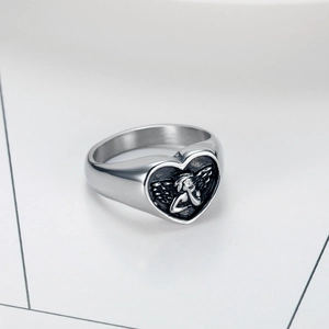 Polished stainless steel angel heart ring with vintage relief design in silver finish