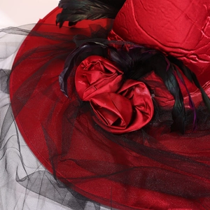 Red witch hat with black feathers, roses, and mesh for Halloween costume parties
