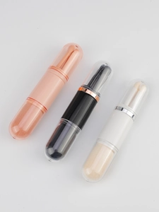 Compact 4-in-1 travel makeup brush set in pink, black and white with protective clear caps