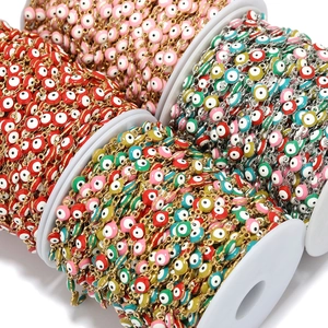 Colorful Evil Eye enamel bead chains in various colors on rolls for DIY jewelry making