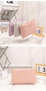 Detailed close-up of quilted PU leather crossbody bags with gold chain straps in multiple colors
