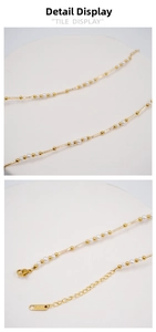 Detail of 14K gold plated necklace featuring small pearls and lobster clasp closure