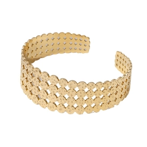 Modern gold open cuff bracelet with hammered geometric texture and hollow woven design