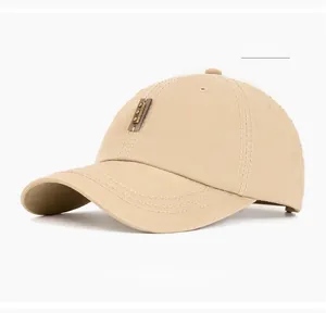 Detail of khaki washed cotton baseball cap with bronze rivets and wave stitching
