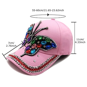 Pink baseball cap with rhinestone butterfly design and adjustable sun protection brim