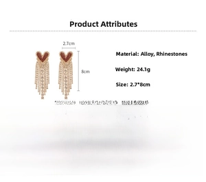 Detail view of heart-shaped tassel earrings with dimensions and silver needle feature