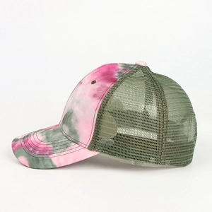 Side view of tie-dye trucker hat featuring pink and olive mesh breathable fabric