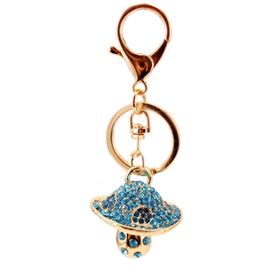Sparkling gold keychain with a mushroom pendant covered in shiny blue rhinestones