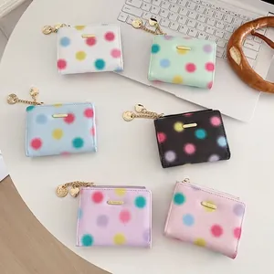 Short zip wallet for women with colorful polka dots and heart charm in six colors