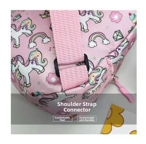 Detail of adjustable pink shoulder strap and buckle on children's unicorn pattern bag