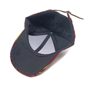 Inside view of Bohemian retro baseball cap showing ethnic stripe weave and leather strap