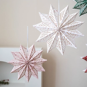 3D Nordic Christmas star ornaments with cutout patterns for festive tree decoration