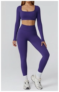 Detail of deep purple seamless yoga set showing breathable knit texture and high waist fit