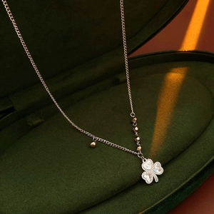 Silver beaded chain necklace with clover pendant and 520 engraving in a jewelry box