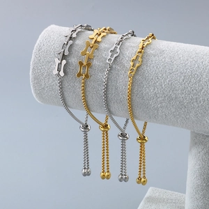 Adjustable stainless steel drawstring bracelets with bone and cross charms in gold and silver