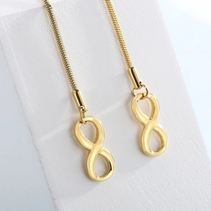 Gold infinity pendant with sleek snake chain necklace in minimalist titanium steel design
