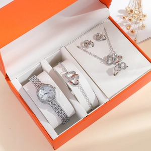 Elegant 5-piece silver women's watch gift set with heart jewelry in a stylish orange box