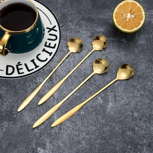 Set of 4 gold stainless steel long handle spoons with flower blossom shaped heads