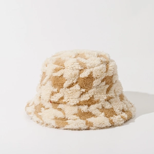 Plush houndstooth bucket hat in khaki and beige for winter warmth on white background