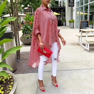 Detail of red and white striped long sleeve shirt with asymmetrical irregular hemline