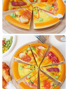 Detailed close-up and top view of realistic faux pizza model with vibrant food textures