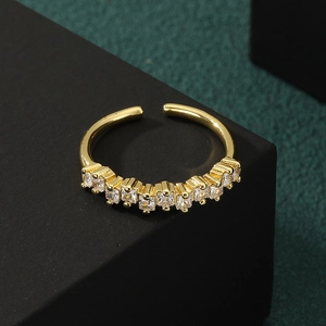 Adjustable golden copper ring featuring a row of square sparkling zircon stones
