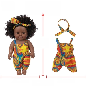 Size specifications for 12-inch African baby doll with height and width measurements