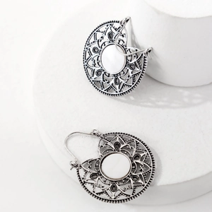 Vintage hollow flower hoop earrings with white inlay in bohemian ethnic silver style