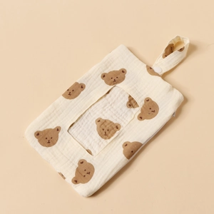 Detail of baby crib hanging organizer bag in cotton gauze with brown bear prints