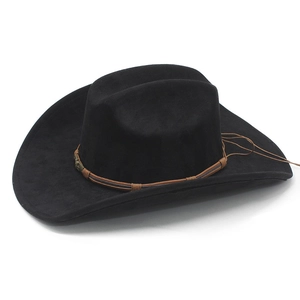Detail of black faux suede cowboy hat featuring a braided brown band with vintage metal badge