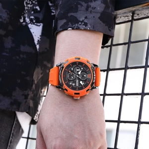 Montre chronographe de sport pour homme avec bracelet orange et cadran noir lumineux