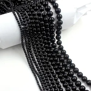 Polished black glass round beads for DIY jewelry making in multiple sizes from 2mm to 10mm