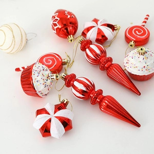 9-piece set of red and white Christmas ornaments featuring candy cane and cupcake shapes