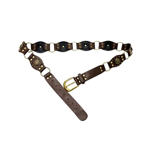 Detail of dark brown leather belt with brass studs and metal rings in western retro style
