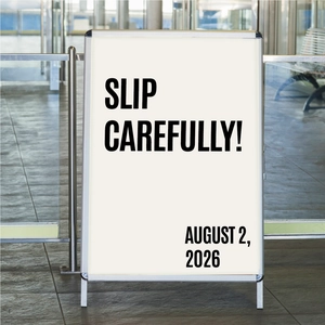 Silver A-frame aluminum poster stand mockup in a clean modern indoor mall background