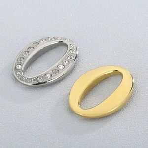 Elegant geometric oval pendant with sparkling zircons in silver and gold finishes