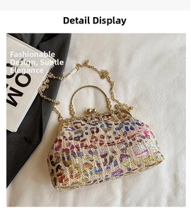 Close-up of colorful woven texture and rhinestone bow clasp on the luxury evening bag
