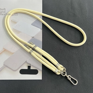 Detail of 8mm thick woven yellow crossbody phone lanyard with silver metal hook and tab