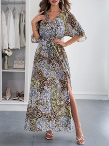 Detail view of V-neck printed maxi dress with side slit and leopard floral pattern