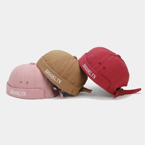 Detailed close-up of Brooklyn letter embroidery on cotton miki hats in multiple colors