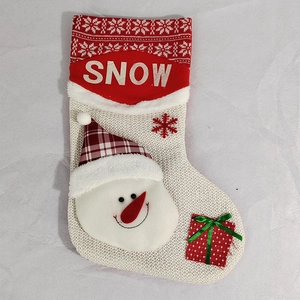 White knitted Christmas stocking with snowman design and SNOW embroidery decoration