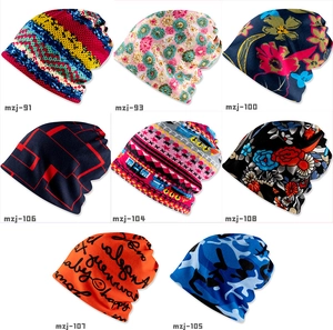 Detail showcasing eight colorful patterns of dual-layer knit neck warmers and beanies