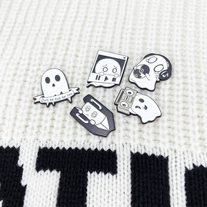 5-piece set of cartoon ghost enamel pins in black and white featuring music themes
