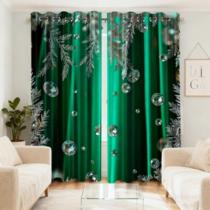 Close-up of emerald green blackout curtain with silver leaf and gemstone pattern detail