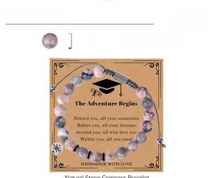 Detail of pink zebra jasper compass bracelet with 8mm natural stone beads and card