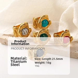 Detailed macro view of vintage titanium steel rings with turquoise and snake texture
