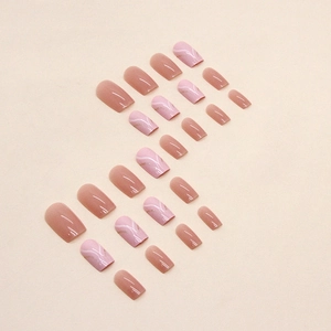 Press-on nails with nude pink waves and gold glitter in a natural square-round shape